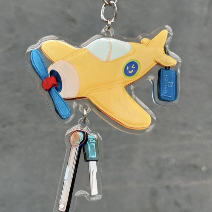 caleb yellow small airplane keychain charm